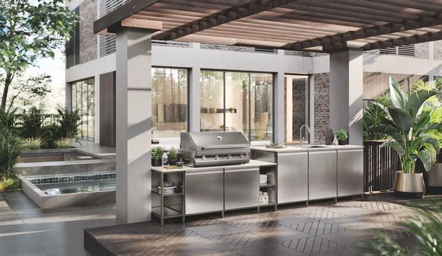 Cuisine Formalia Outdoor de Scavolini, design Vittore Niolu. Caractéristiques : structure et rayons en Acier avec Système Paroi Status finition Titane ; porte et profil poignée en Acier ; plan en Dekton Entzo ép.2 cm.